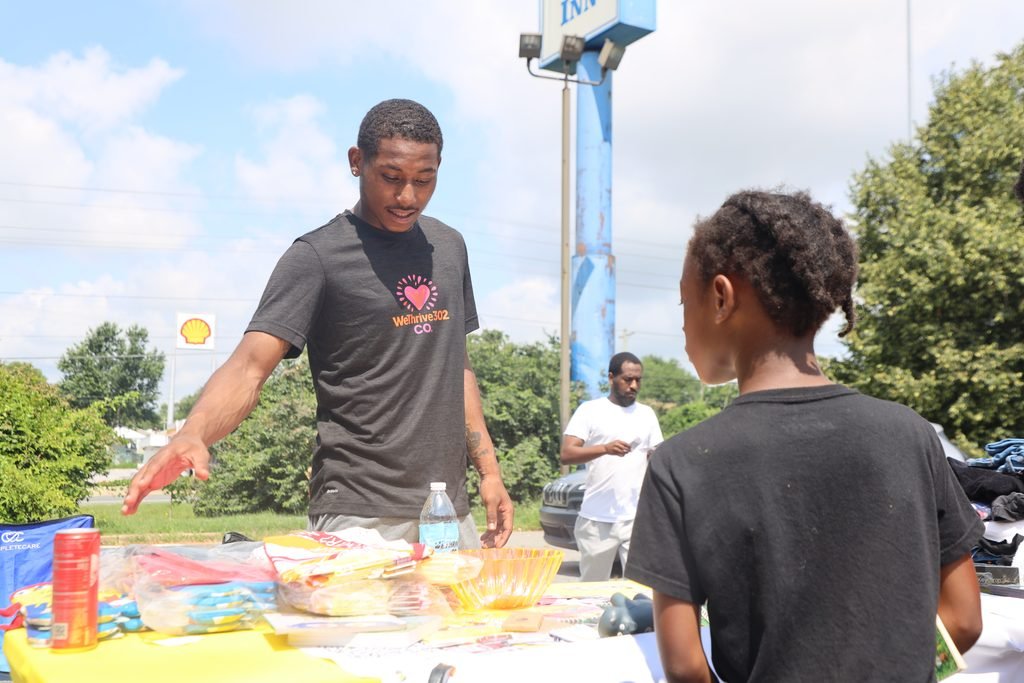 Supplies handed out at a community resource table.